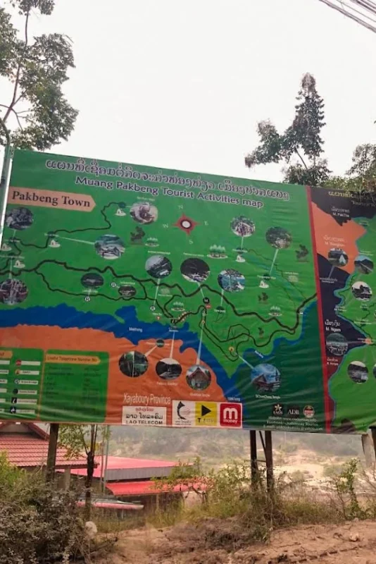 Slow Boat Laos: My Honest Guide After Doing It Twice (2026) 45 Big sign in Pakbeng showing a few tourist attractions in the area