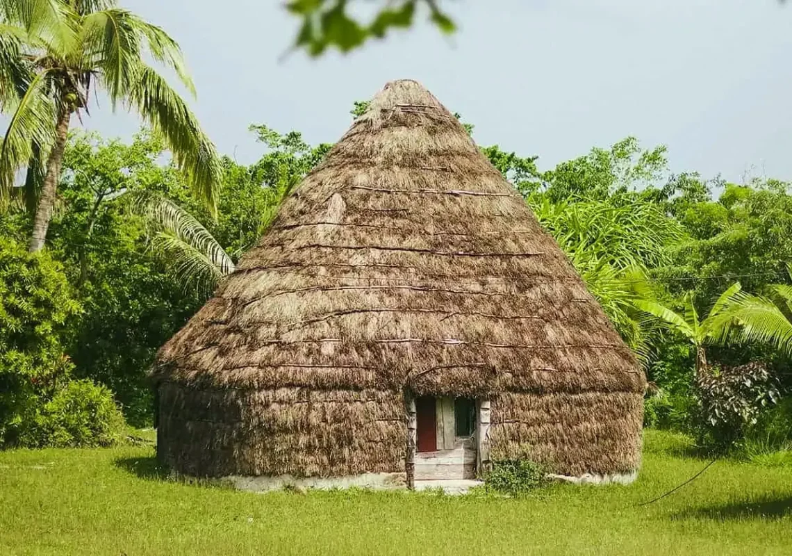 A traditional thatched hut in Lifou, New Caledonia.