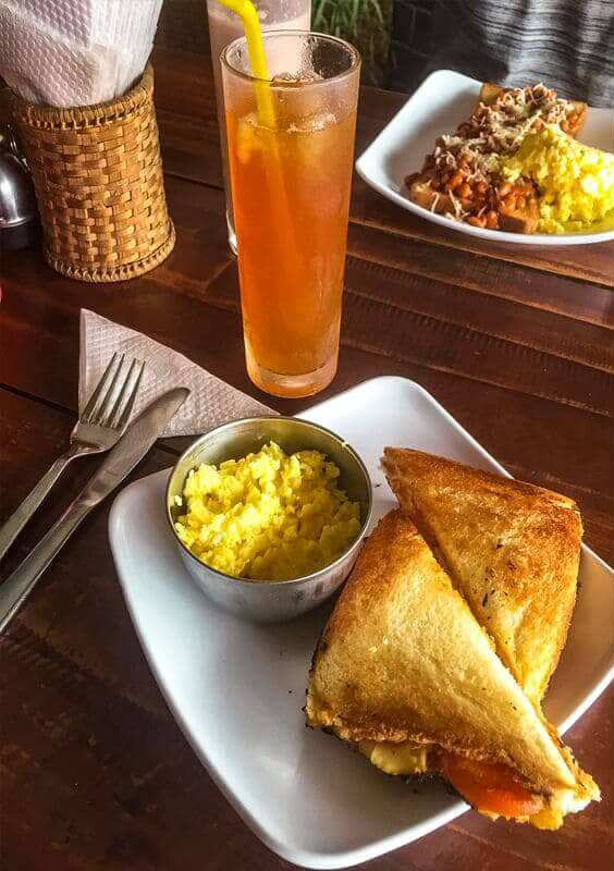 Best Restaurants In Pokhara: Cafes, Cheap Eats & Local Food 40 a cheese and tomato toastie and scrambled egg with a iced tea in pokhara