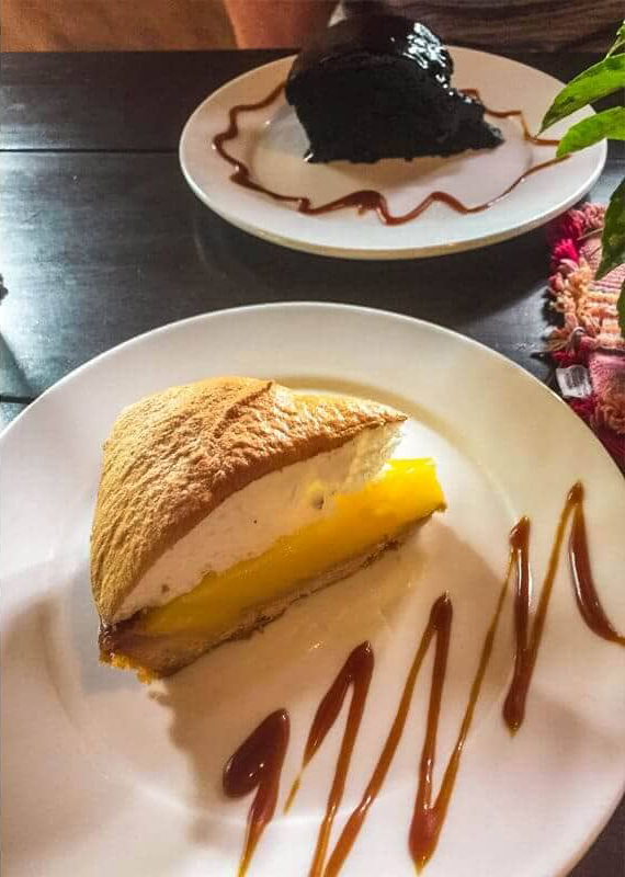 Best Restaurants In Pokhara: Cafes, Cheap Eats & Local Food 30 lemon meringues and chocolate cake from Caffe Concerto in Pokhara