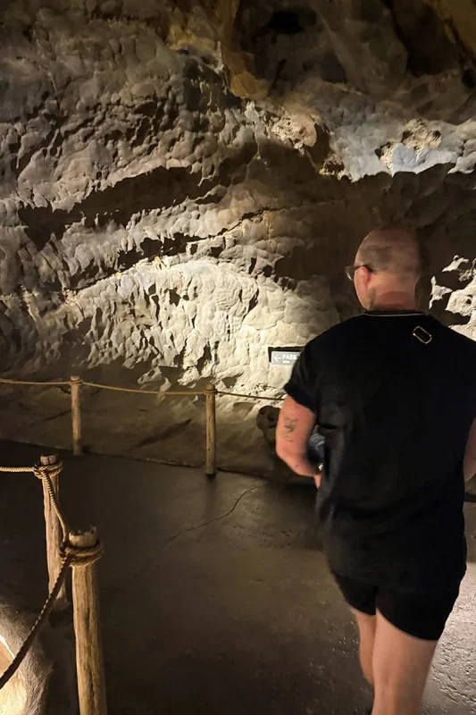Rainforest Wild Adventure Review: My Honest Guide 23 A man walking through the Cavern in Rainforest Wild Adventure