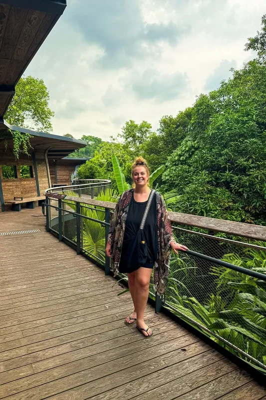 Tasha Amy standing on the boardwalk at Rainforest Wild Adventure in Singapore