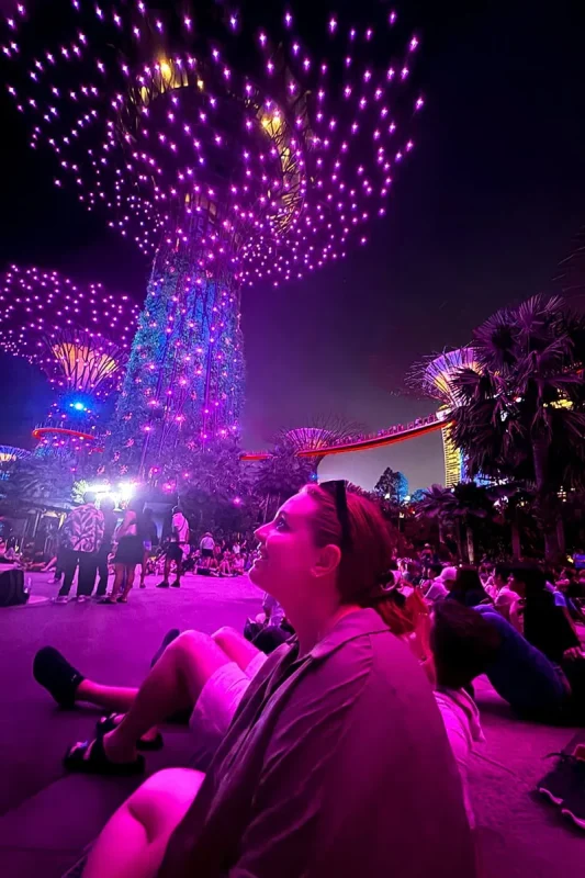 Spectra Light Show Singapore: Times, Best Views & Tips 21 Tasha Amy looking up watching the Garden Rhapsody show at Gardens By The Bay