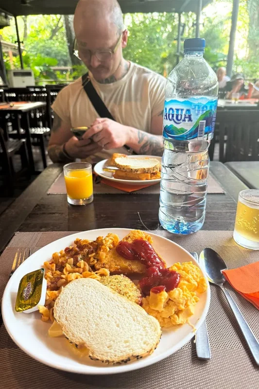 Breakfast In The Wild Singapore Zoo: Is It Really Worth Booking? 14 A plate of bread, scrambled egg, hasbrowns and pasta at Breakfast In The Wild Singapore