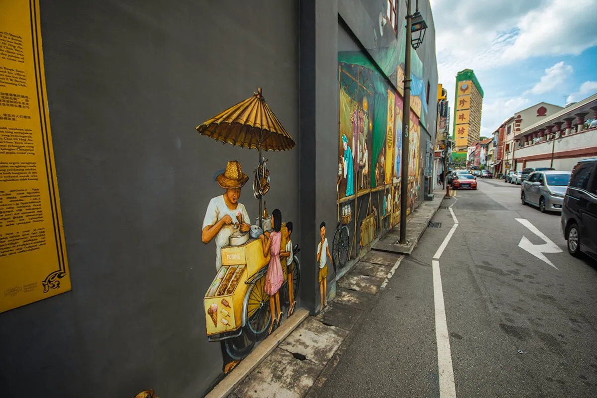 The Perfect 3 Days In Singapore Itinerary For First-Time Visitors 25 Streetart of a man and a cart serving icecream along the street in Chinatown Singapore