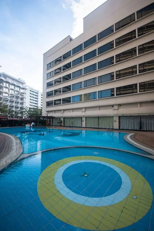 Furama RiverFront Review: What It’s Really Like To Stay Here 10 Outdoor swimming pool beside the Furama RiverFront hotel building