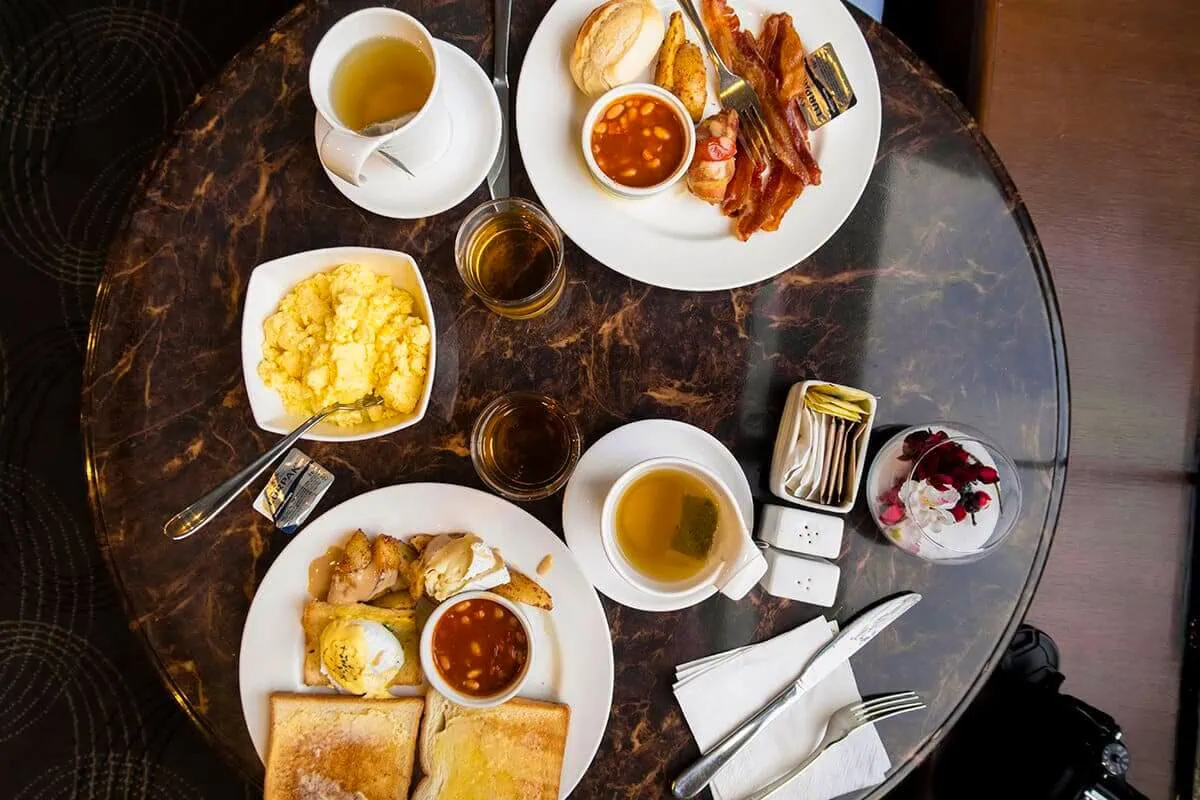 Furama RiverFront Review: What It’s Really Like To Stay Here 17 Breakfast plates with eggs, toast, baked beans, potatoes and bacon at Furama RiverFront