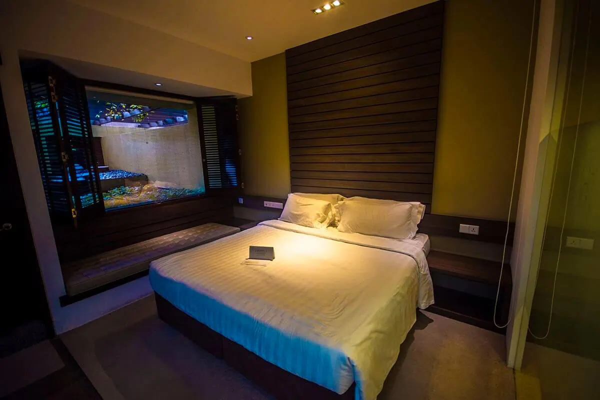 Furama RiverFront Review: What It’s Really Like To Stay Here 6 Courtyard Club Room with a double bed and window overlooking the private courtyard