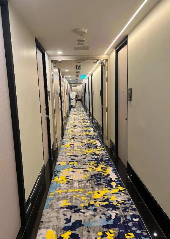 Hotel Mi Rochor Review: Is It Worth Staying Here? (2026) 23 Looking down the hallway at Hotel Mi Rochor