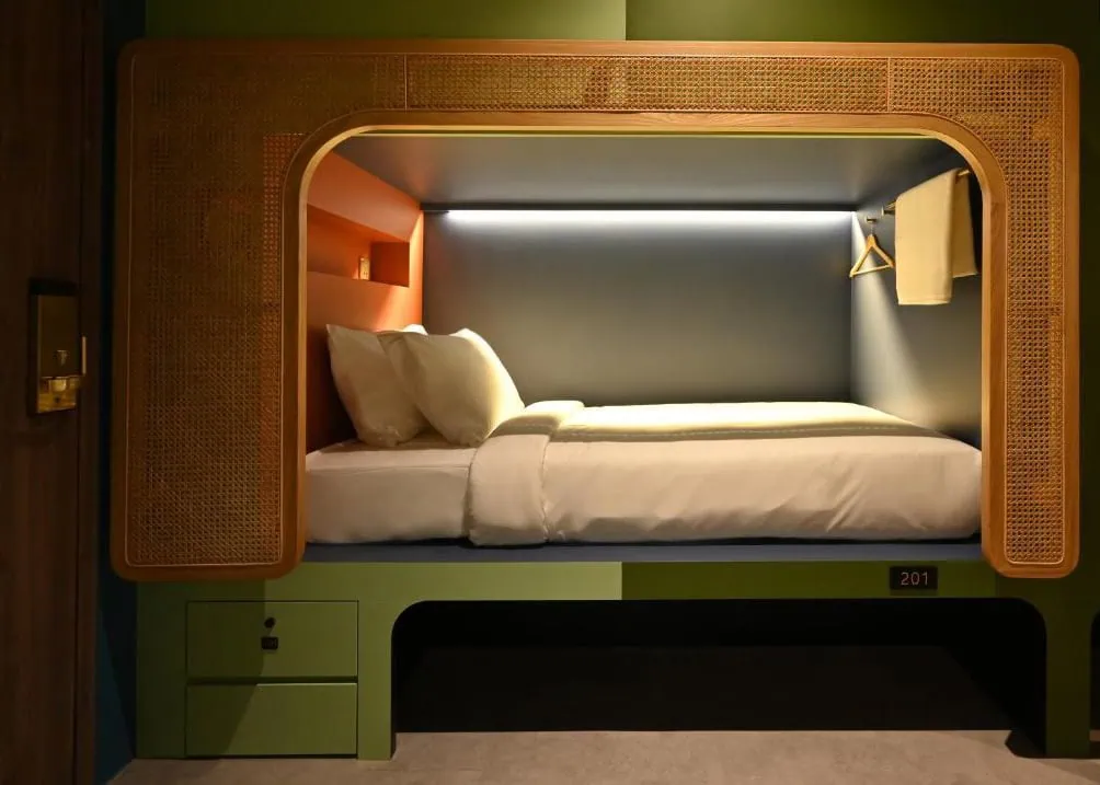Where To Stay In Singapore: The 6 Best Areas & Hotels 32 Private sleeping pod with a double bed at Dream Chaser Boutique Capsule Hotel in Singapore.