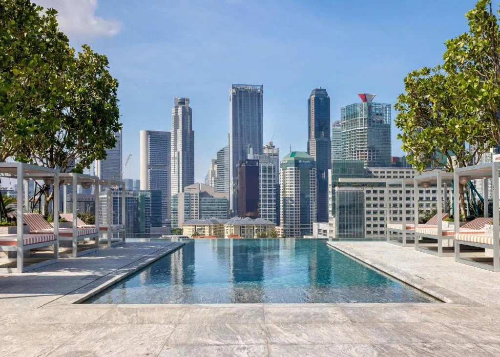 Where To Stay In Singapore: The 6 Best Areas & Hotels 24 Rooftop infinity pool at Mondrian Singapore Duxton overlooking the city skyline