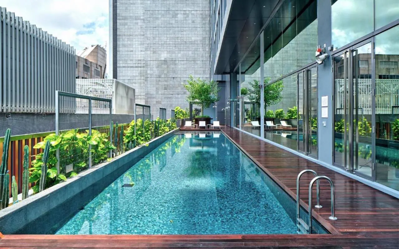 Where To Stay In Singapore: The 6 Best Areas & Hotels 46 Outdoor swimming pool and sun deck at YOTEL Singapore Orchard Road