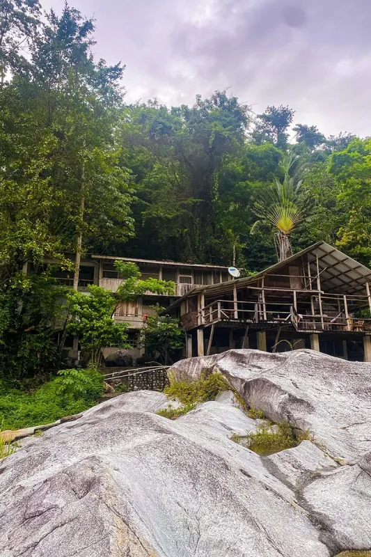 White Water Rafting In La Ceiba: My Experience On The Cangrejal River 39 Jungle River Lodge surrounded by rainforest and large rocks near La Ceiba