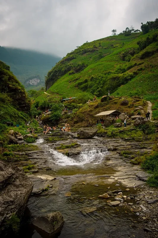 Du Gia Waterfall: What It’s Really Like On The Ha Giang Loop 51 Rocky stream flowing through the valley below Du Gia Waterfall