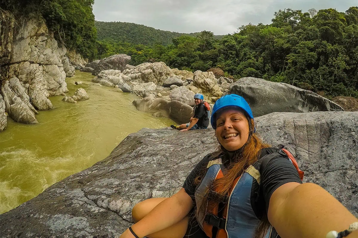 White Water Rafting In La Ceiba: My Experience On The Cangrejal River 26 Tasha taking a selfie on a boulder before white water rafting in La Ceiba