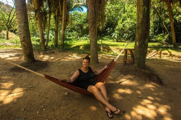 Tasha Amy relaxing on a hammock at the local brewery in Roatan, Honduras